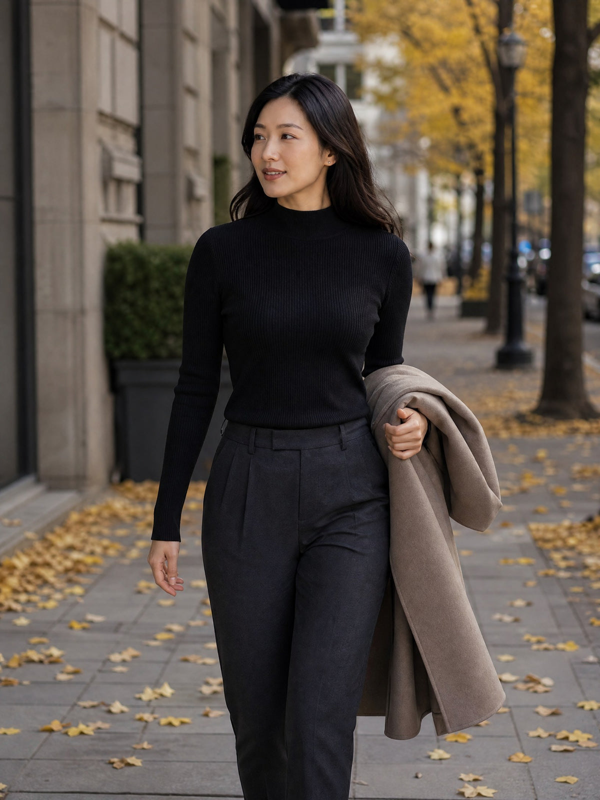 Elite Journey worn discreetly beneath a black mock-neck knit
